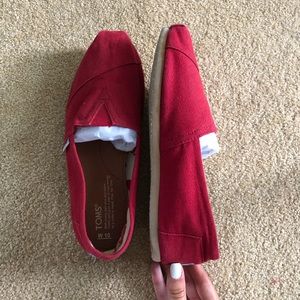 Red TOMS shoes